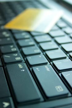 Credit card on computer keyboard