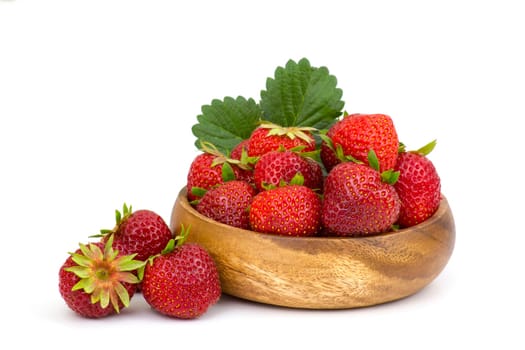 fresh strawberries in a bowl on white background