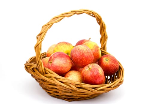 fresh apples in a basket on white background