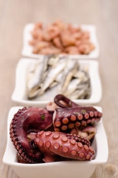 Antipasti octopus in a bowl of porcelain
