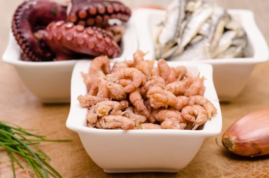 Peeled North Sea crabs in a white bowl of porcelain