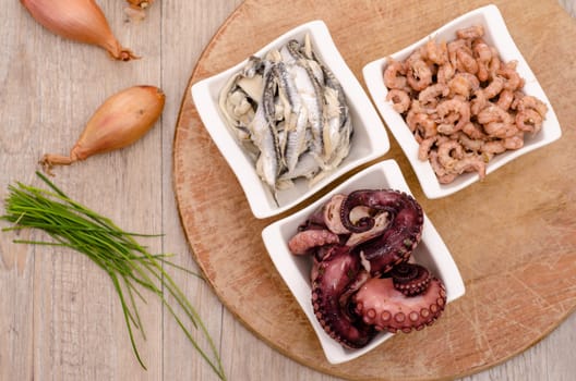 Seafood Antipasti on a wooden board