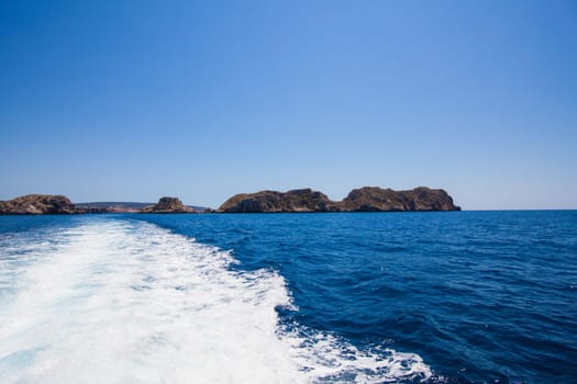 The waves from a high-speed boat. waterway. Sea Travel