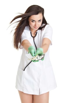 woman doctor with pills in hand. Female doctor holding many pills in her hands