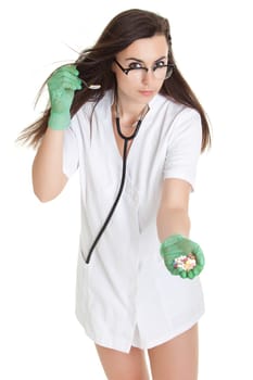 woman doctor with pills in hand. Female doctor holding many pills in her hands