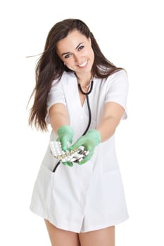 woman doctor with pills in hand. Female doctor holding many pills in her hands