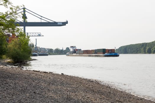 Container ships in front of the Rhine port in Bonn