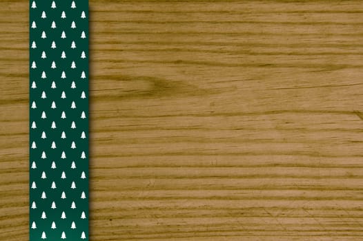 Wooden board with Christmas green fabric