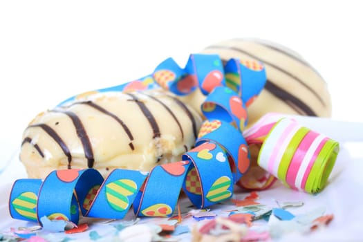 Berliners covered with icing and chocolate
