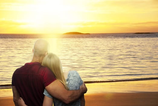 A Golden Warm Sunset at the Sea With Sandy Beach