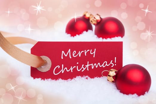 A Red Tag With Merry Christmas on it as Christmas Background