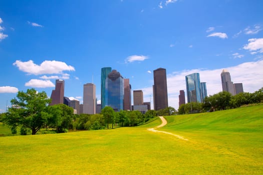 Houston Texas Skyline with modern skyscapers and blue sky view from park lawn