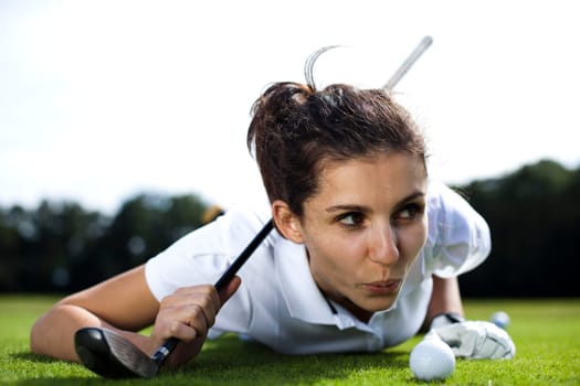 Woman playing golf