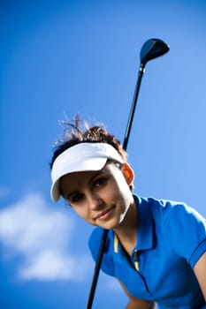 Woman playing golf
