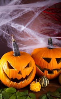 Halloween background with web and spider,pumpkin