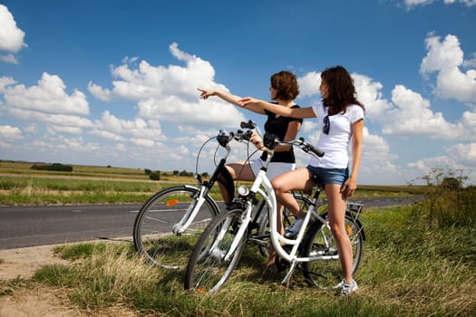 Young woman riding bike
