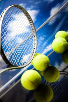 Tennis racket and balls