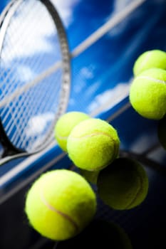 Tennis racket and balls