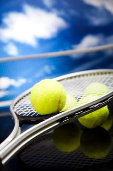 Tennis racket and balls