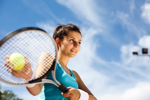 Girl Playing Tennis