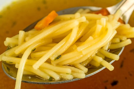 Beef broth with pasta