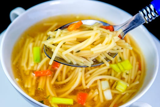 Beef broth with pasta