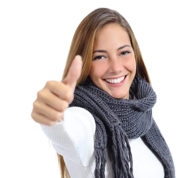 Beautiful wrapped up woman happy in winter isolated on a white background