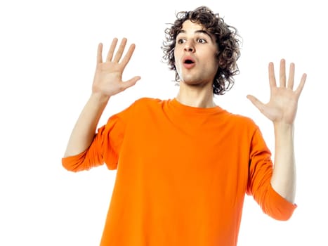 one young man caucasian gesturing  surprised fear afraid portrait  in studio white background