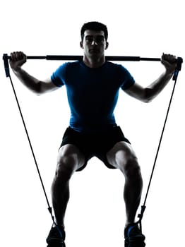 one caucasian man exercising workout fitness in silhouette studio  isolated on white background