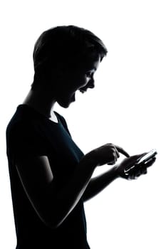 one caucasian young teenager silhouette girl telephone videophone video game  portrait in studio cut out isolated on white background