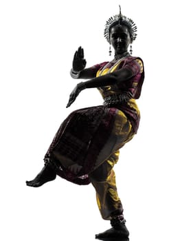 one indian woman dancer dancing in silhouette studio isolated on white background