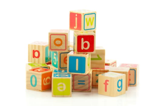 wooden toy cubes with letters. Wooden alphabet blocks.