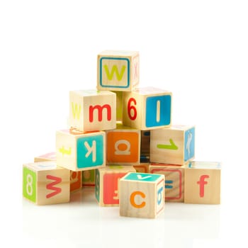wooden toy cubes with letters. Wooden alphabet blocks.