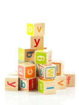 wooden toy cubes with letters. Wooden alphabet blocks.