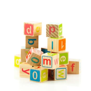 wooden toy cubes with letters. Wooden alphabet blocks.