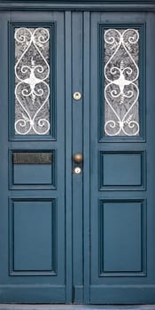 Wooden front door of a home. Old Wooden Door.