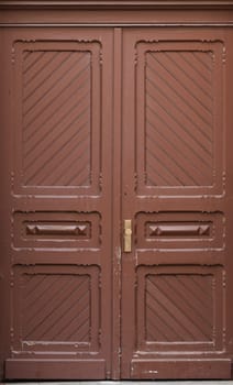 Wooden front door of a home. Old Wooden Door.