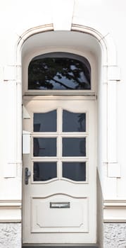 Wooden front door of a home. Old Wooden Door.