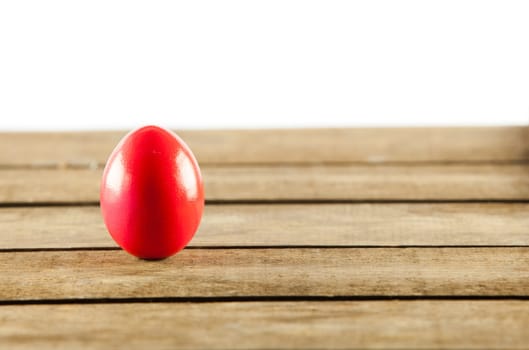 Colorful easter eggs on old wooden background. Easter concept. The colorful painted Easter eggs