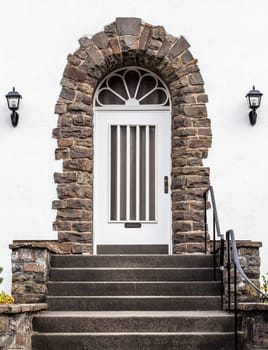 Wooden front door of a home. Old Wooden Door.
