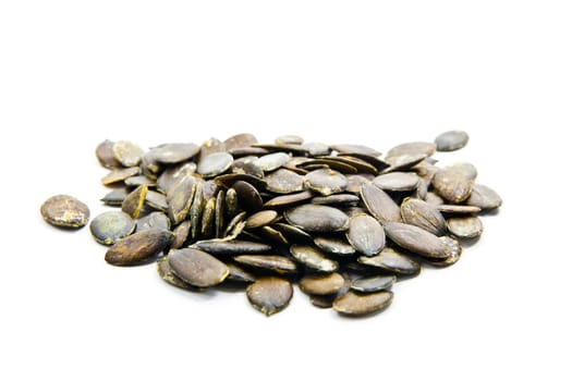 Pumpkin seeds on a white background