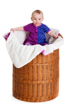 Baby Girl Sitting in the  Basket.