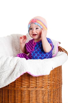 Baby Girl Sitting in the  Basket.