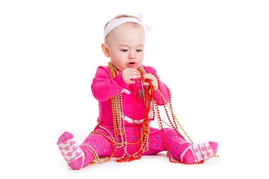 baby girl playing with  beads. beautiful baby girl. Happy Baby Girl