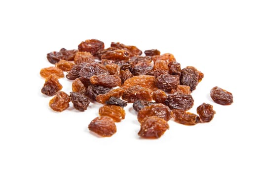 brown raisins on a white background