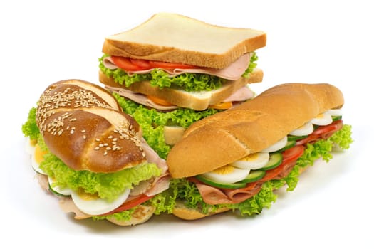 Sandwich assortment,garnished fast food against a white background