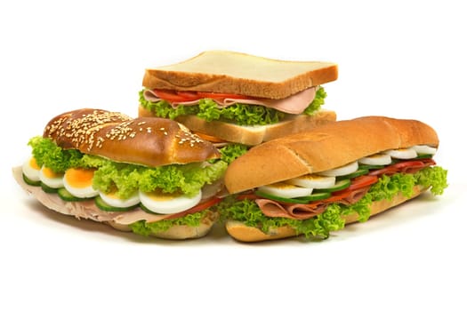 Sandwich assortment,garnished fast food against a white background
