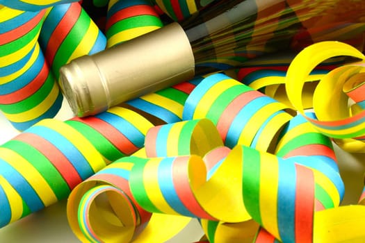 Atmosphere with wine bottle and streamers