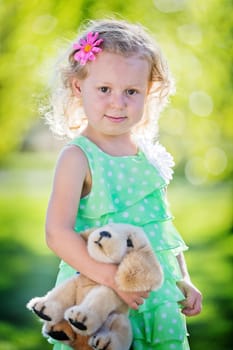 little girl with teddy bear