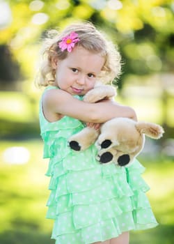 little girl with teddy bear